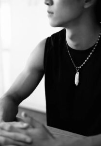 Man in pearl pendant, pearl necklace